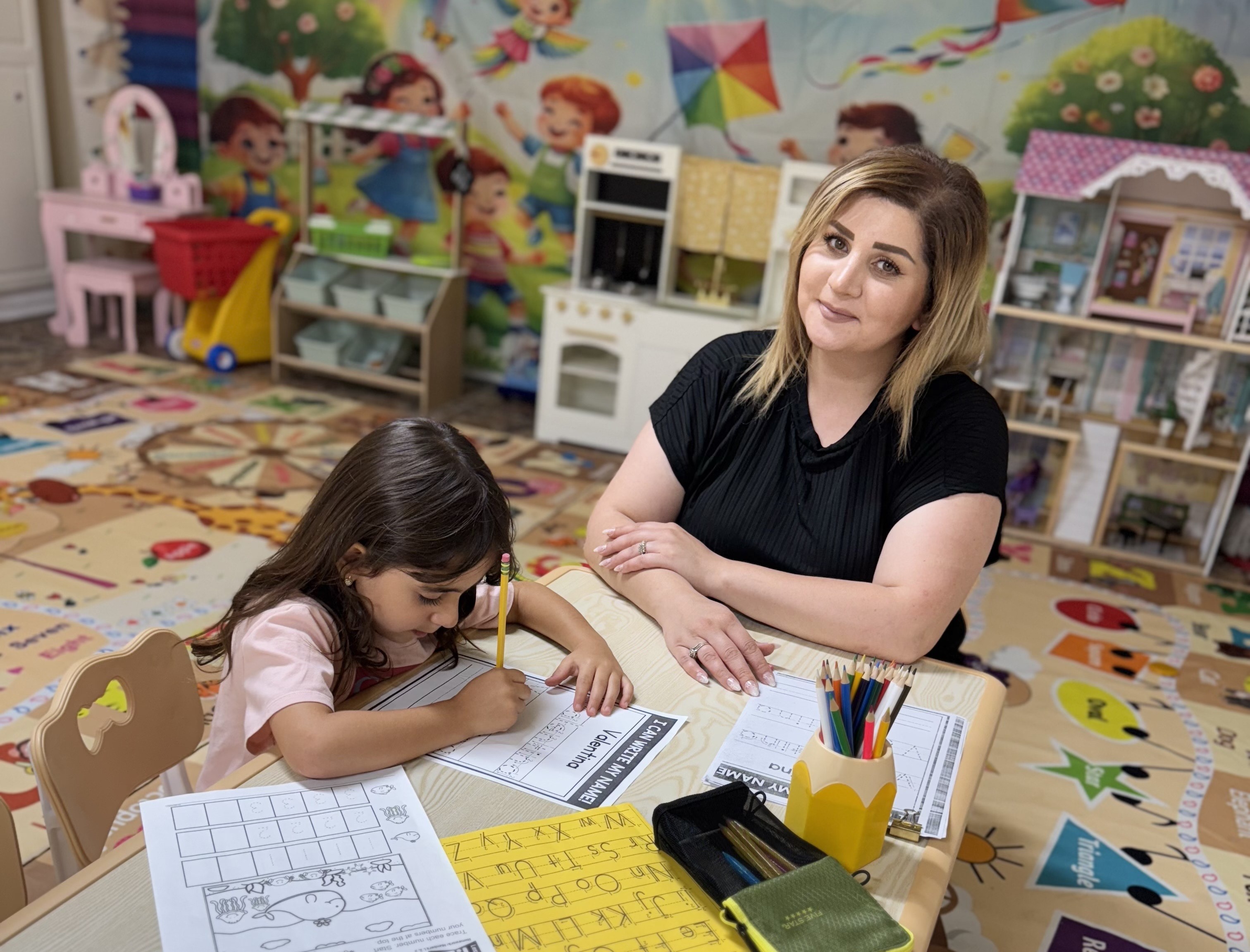 Teacher with children